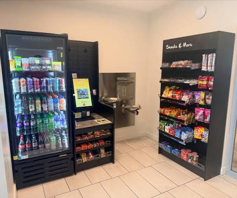 Micro market shelves stocked with snacks and drinks